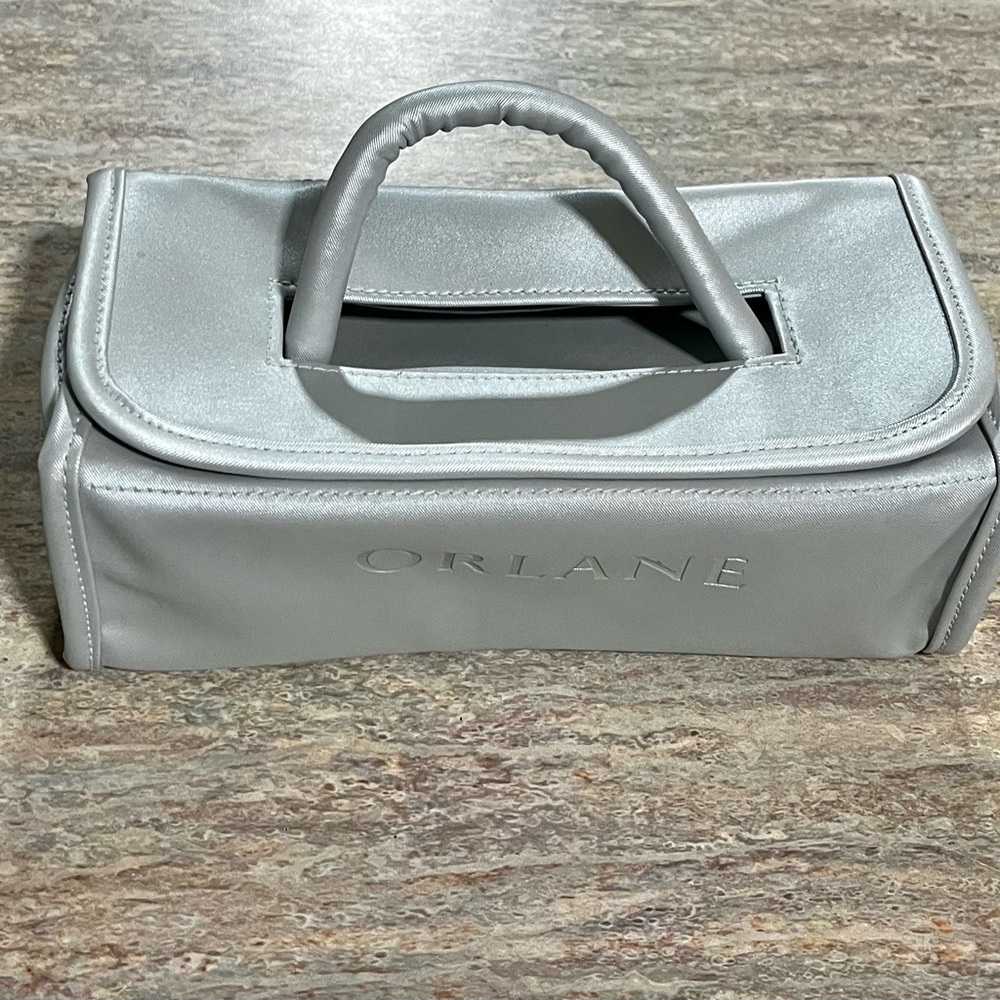 NWOT Orlane Paris silver square w/Velcro cosmetic case